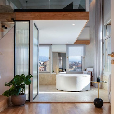 Unwind in the spa-like bathrooms after a day of sightseeing
