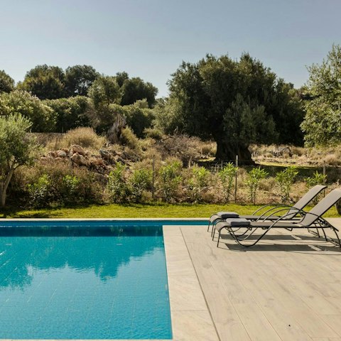 Soak up the sun by the private swimming pool