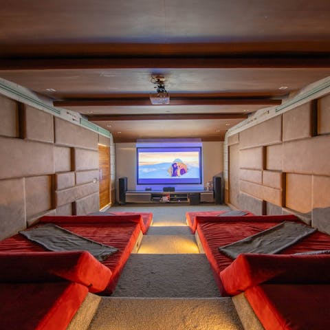 Unwind with a movie night in the plush home cinema