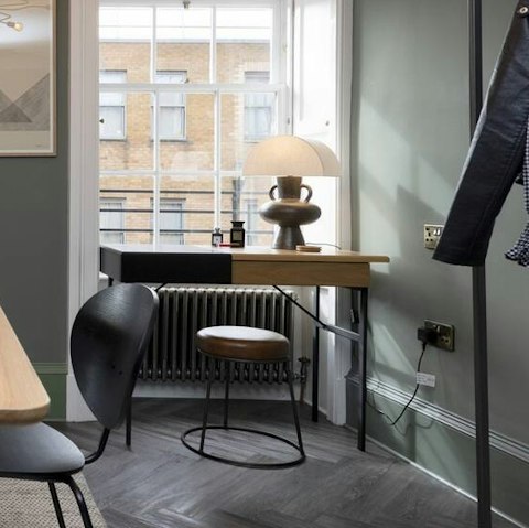 Catch up on work at the window-facing desk