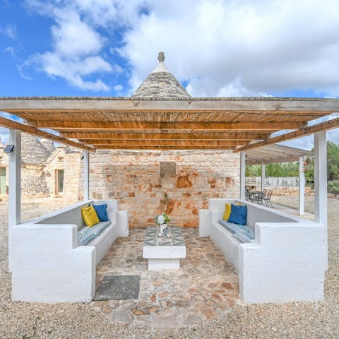 Cook on the wood-fired barbecue and dine in the shade of the veranda