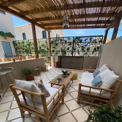 Congregate on the communal patio for baba ganoush, pita and veggies