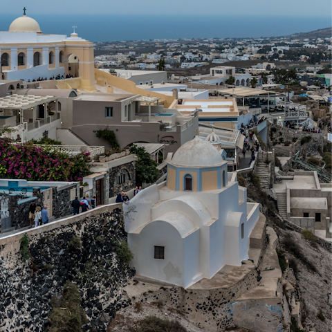 Visit cosmopolitan Fira and its array of restaurants, bars and attractions, 10 kilometres from this home