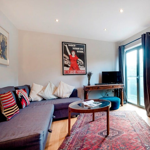 Stretch out on the cosy sofa after a day exploring the city's hotspots