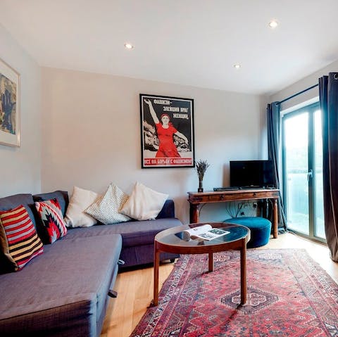 Stretch out on the cosy sofa after a day exploring the city's hotspots