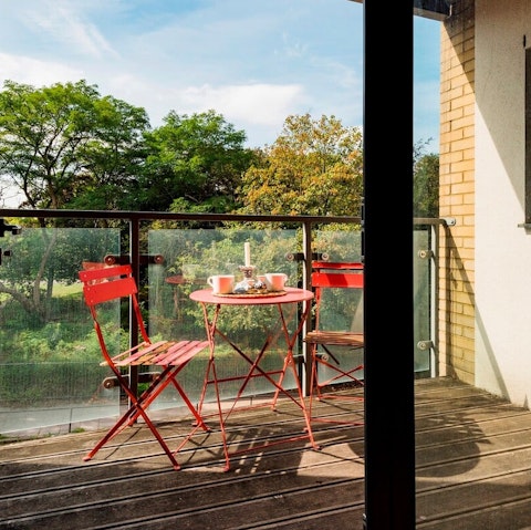 Sip your morning coffee on your private balcony