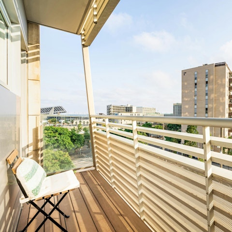 Toast the sunset from the private balcony