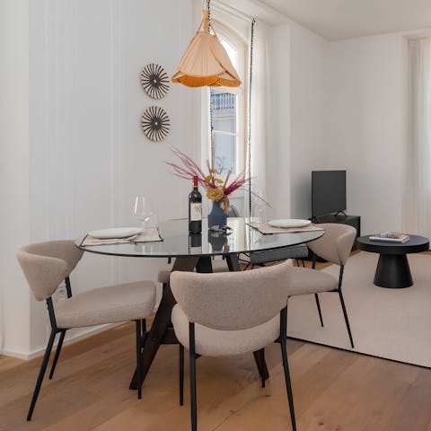 Share a bottle of Port and some Portuguese delicacies at the dining table