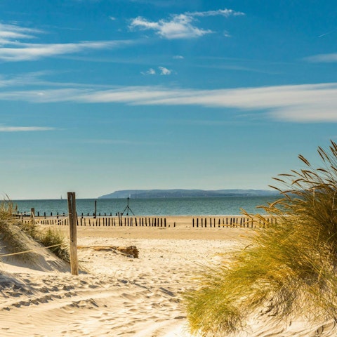 Begin your adventure in West Sussex with a drive to West Wittering Beach