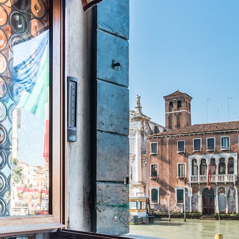 Watch the world go by along the Canal Grande, it’s right outside the window