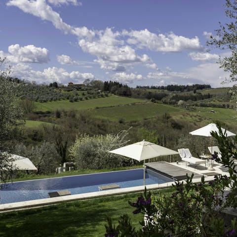 Enjoy incredible views while relaxing by the pool