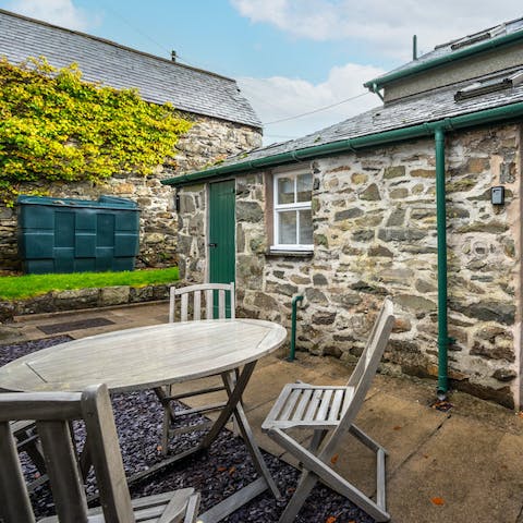 Relax with a glass of local beer in the private garden