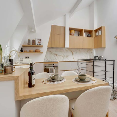 Enjoy a glass of wine and a charcuterie board around the dining table