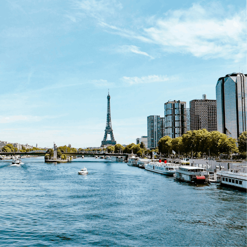 Walk down the banks of the Seine on a warm afternoon