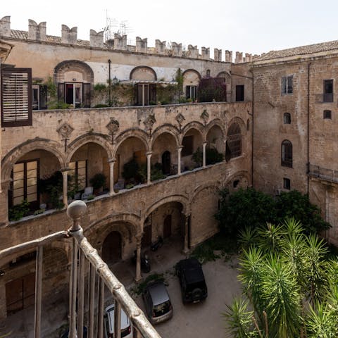 Sip a glass of Sicilian wine after a day spent sightseeing