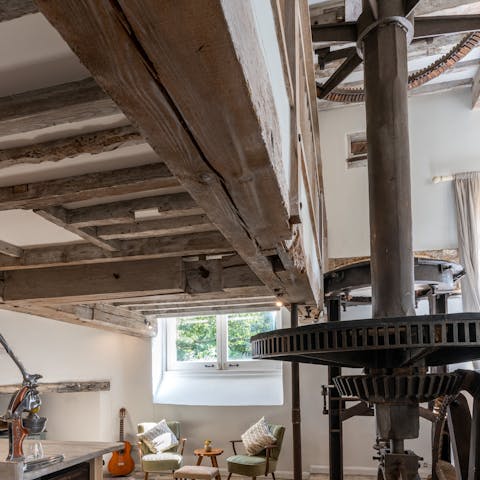 Admire the incredible, original Victorian mill parts in the centre of this home