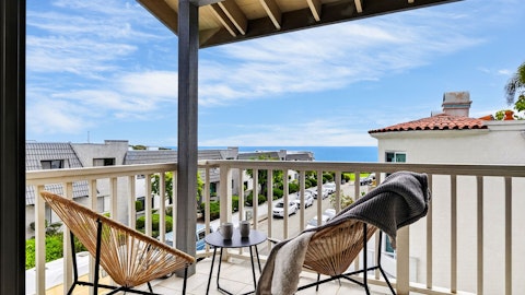 Sit back on the balcony as the ocean stretches out ahead