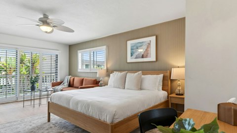 Sleep well in a calm, light-filled room with a glimpse of the Pacific