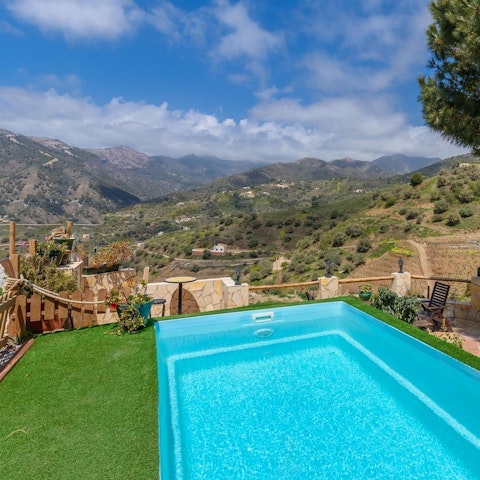Cool off with a dip in your private mountain view pool
