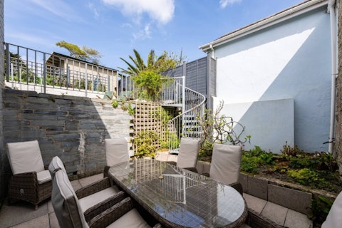 Dine alfresco on the stone-walled terrace