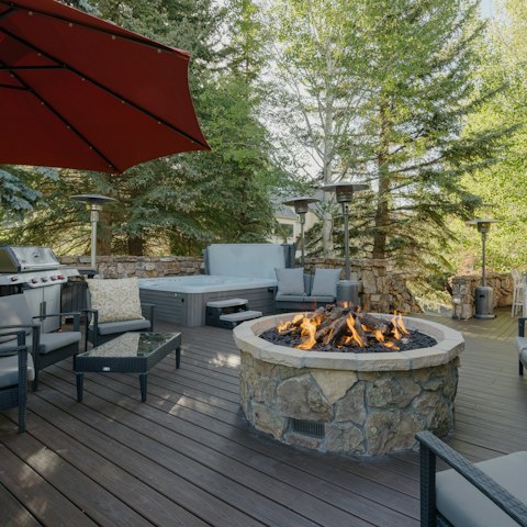 Relax on the patio in winter around the fire pit and heaters