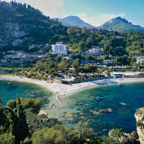 Take a stroll and explore Taormina's coastline