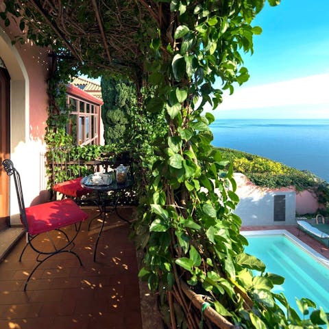 Soak up the sea view from the bedroom balcony