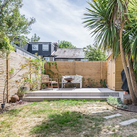 Enjoy picnics in the garden and sunbathe on the raised patio