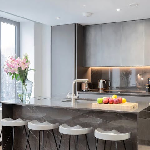 Chat at the breakfast bar and cook up a storm in the contemporary kitchen