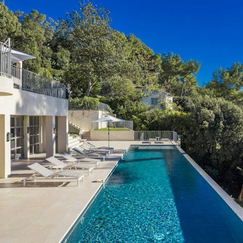 Dive into the heated salt-water pool
