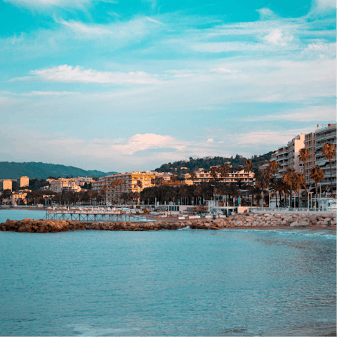 Drive to Croisette Beach Cannes to paddle in the shallows