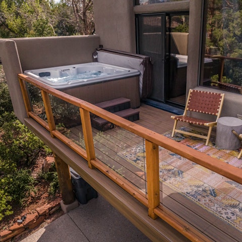 Unwind on the private balcony after a day on the trails