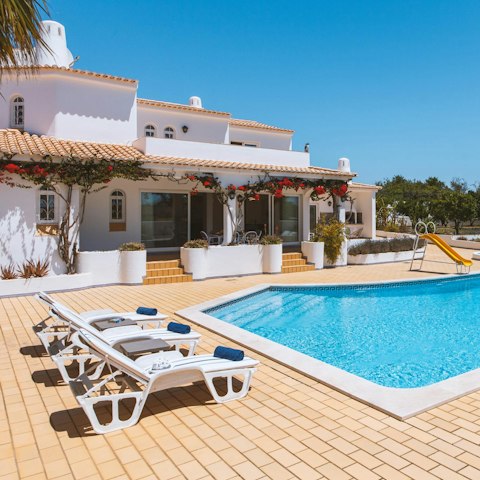 Soak up the sunshine while lounging by the pool