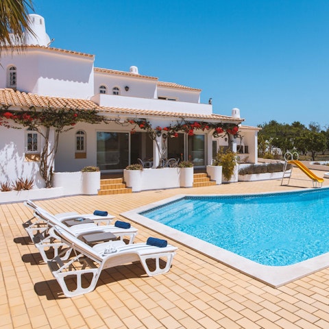 Soak up the sunshine while lounging by the pool