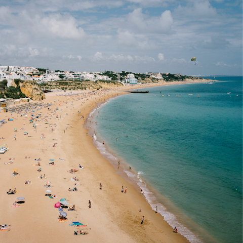 Head to the sandy shores of Praia de Peneco, just ten-minutes by car