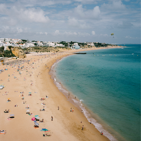 Head to the sandy shores of Praia de Peneco, just ten-minutes by car