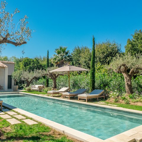 Stretch out poolside beneath the Riviera sun