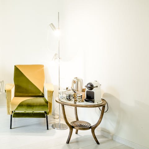 Sit back in the armchair with a Nespresso coffee
