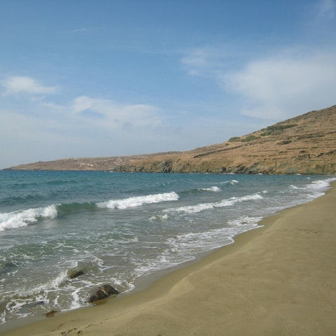 Start each morning with a stroll along Ammos Beach, a short distance away