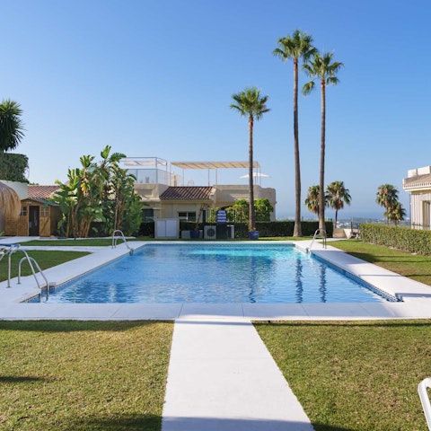 Head to the communal pool for a leisurely swim