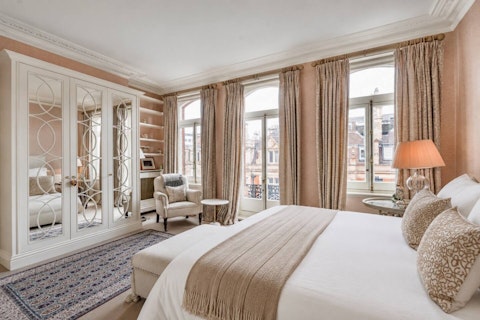 Wake to views over Mayfair through arched windows