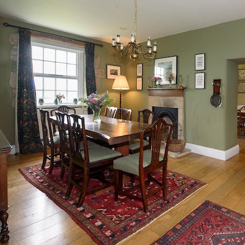 Host a glamorous dinner party in the atmospheric dining area