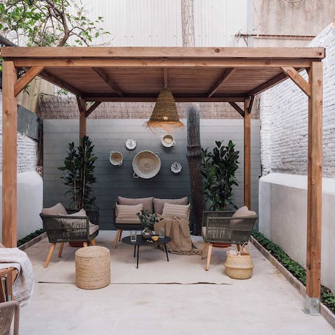 Sip a glass of Cava in the shade on the private terrace