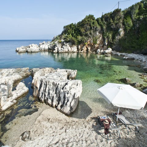 Climb down to the secluded beach at the bottom of the hill