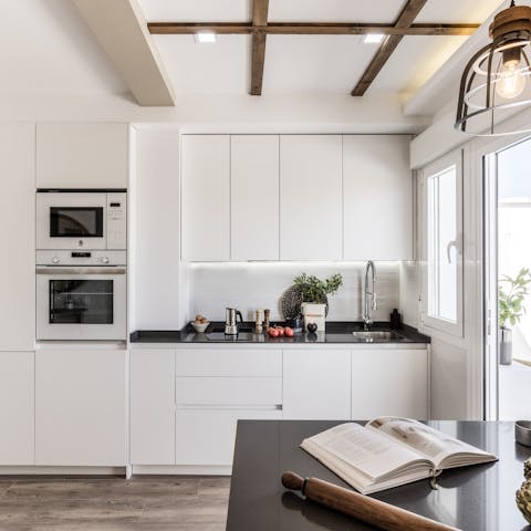 Whip up tapas for dinner in the sleek, modern kitchen