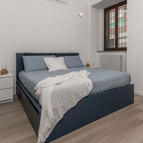 Snuggle into the comfy bed after a day exploring the region