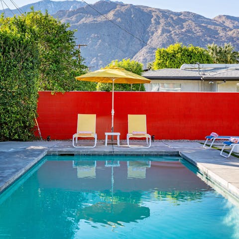 Take a refreshing swim in the pool, surrounded by those stunning mountain views