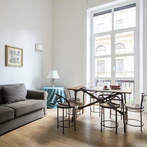 Sit down at the light and airy dining table for lunch