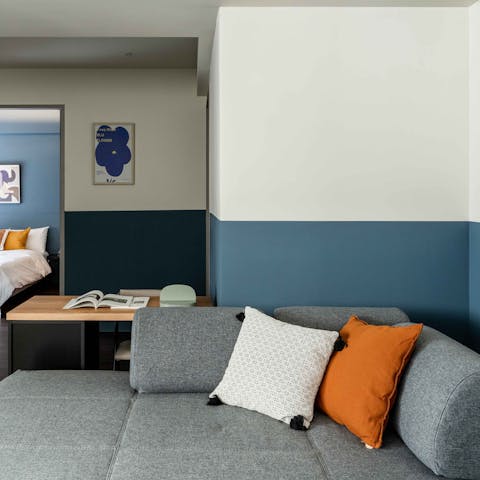 Stretch out in the living area after a day of soaking up the city's sights