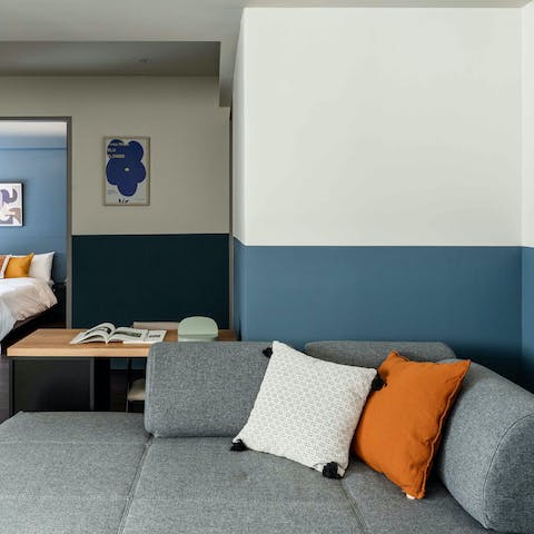 Stretch out in the living area after a day of soaking up the city's sights